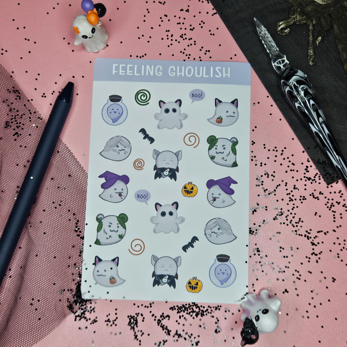 Sticker sheet with a variety of ghouls and ghosts in costumes