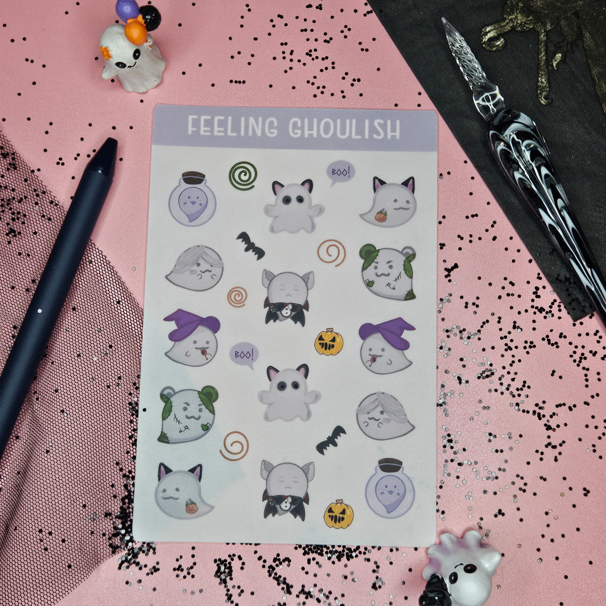sticker sheet with ghosts/ghouls in a variety of costumes