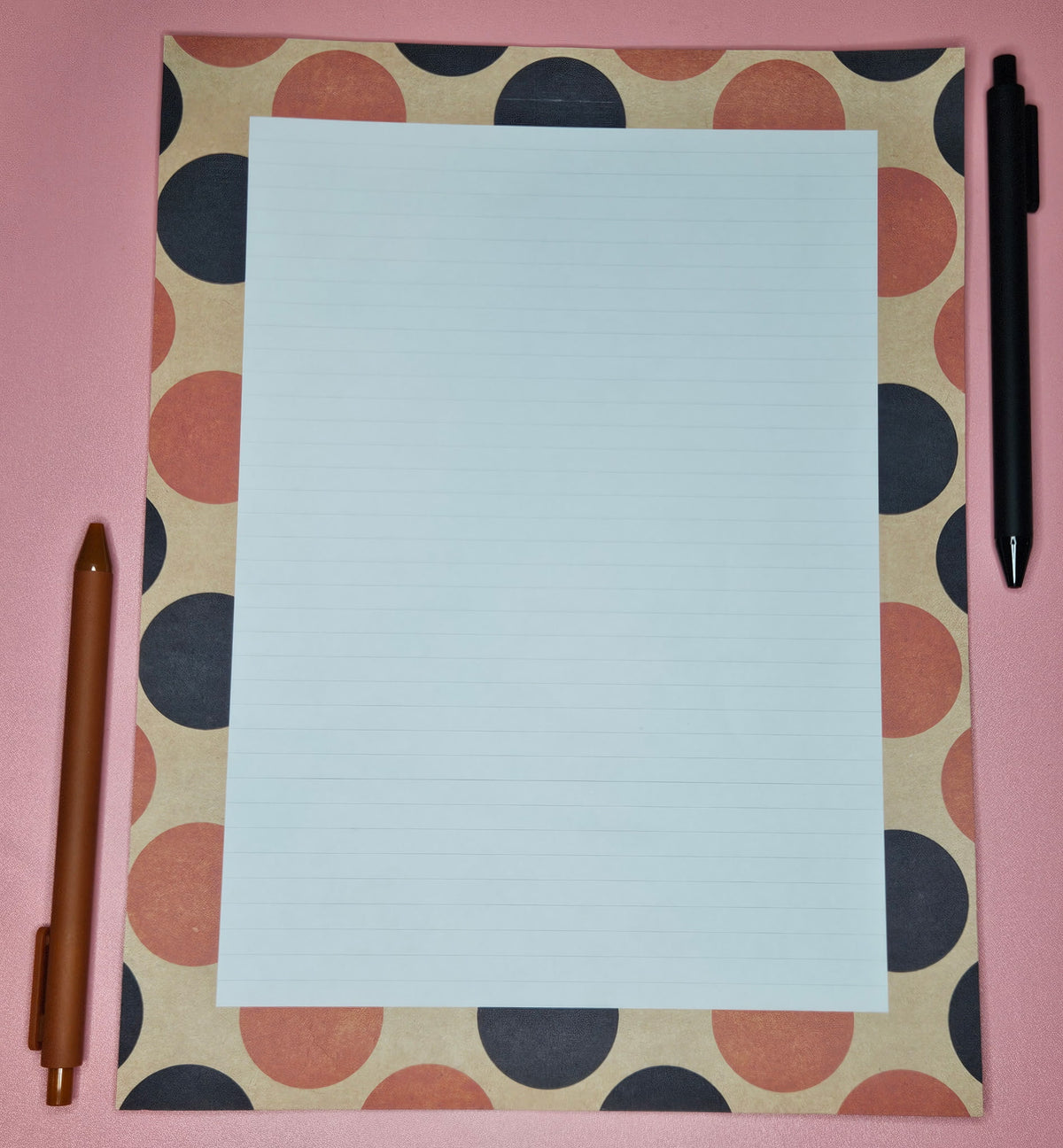 sheet of loose leaf paper with light college ruled lines