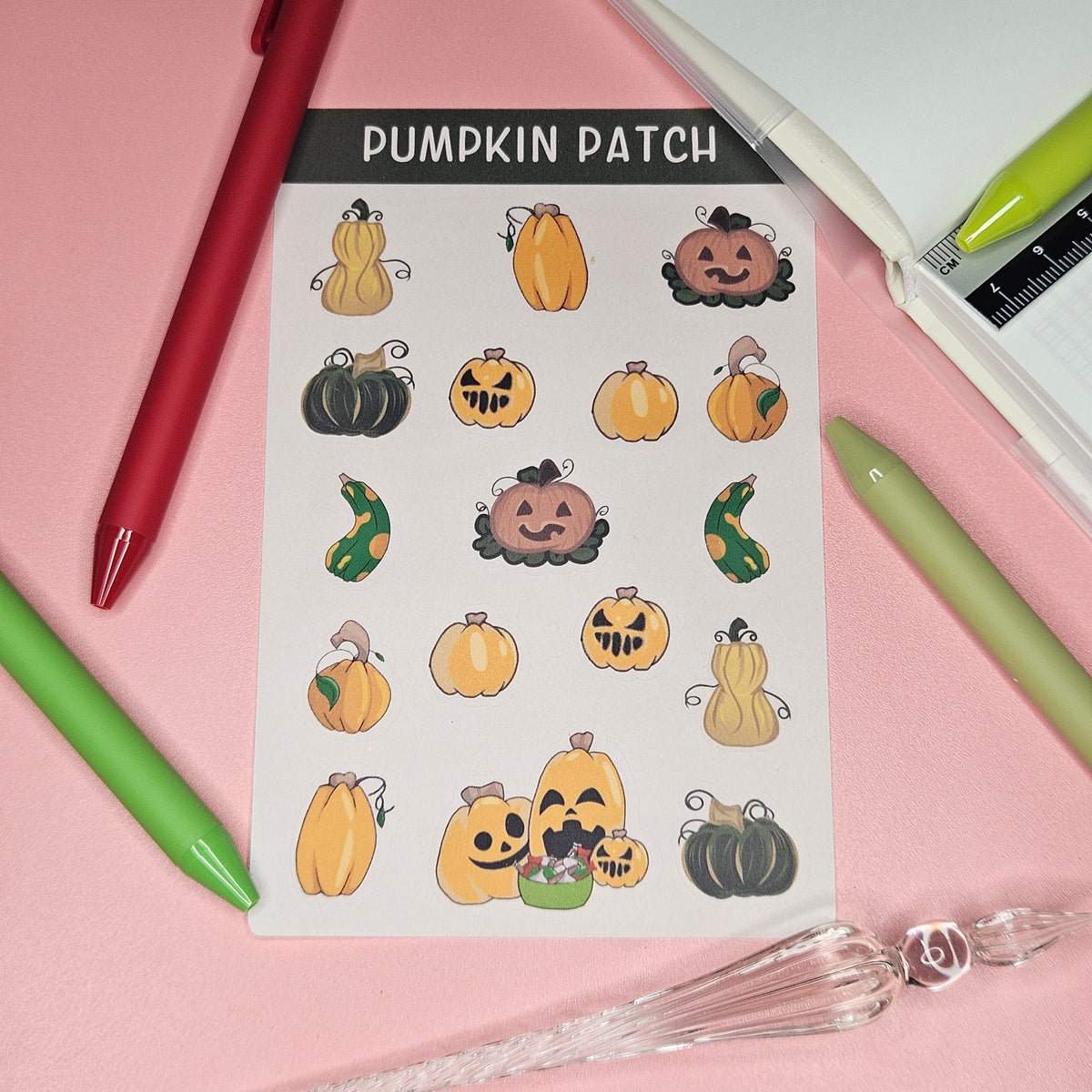 sticker sheet with a variety of pumpkins with and without faces 